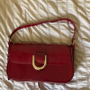 Elegant Red Crossbody Bag with Gold Accents